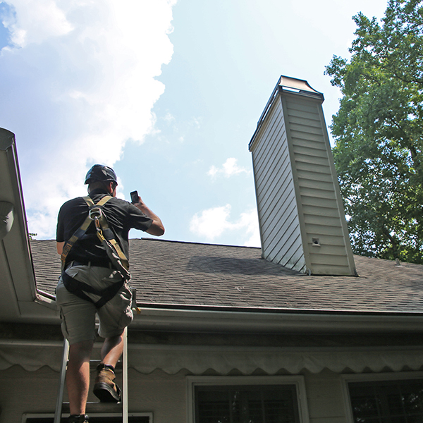 Inspecting a chimney for any damage in Canyon IL