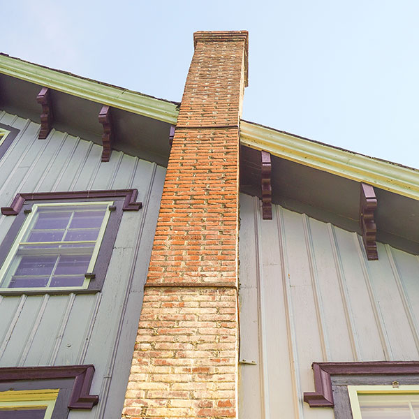 damaged leaning chimney in Dyersville IA